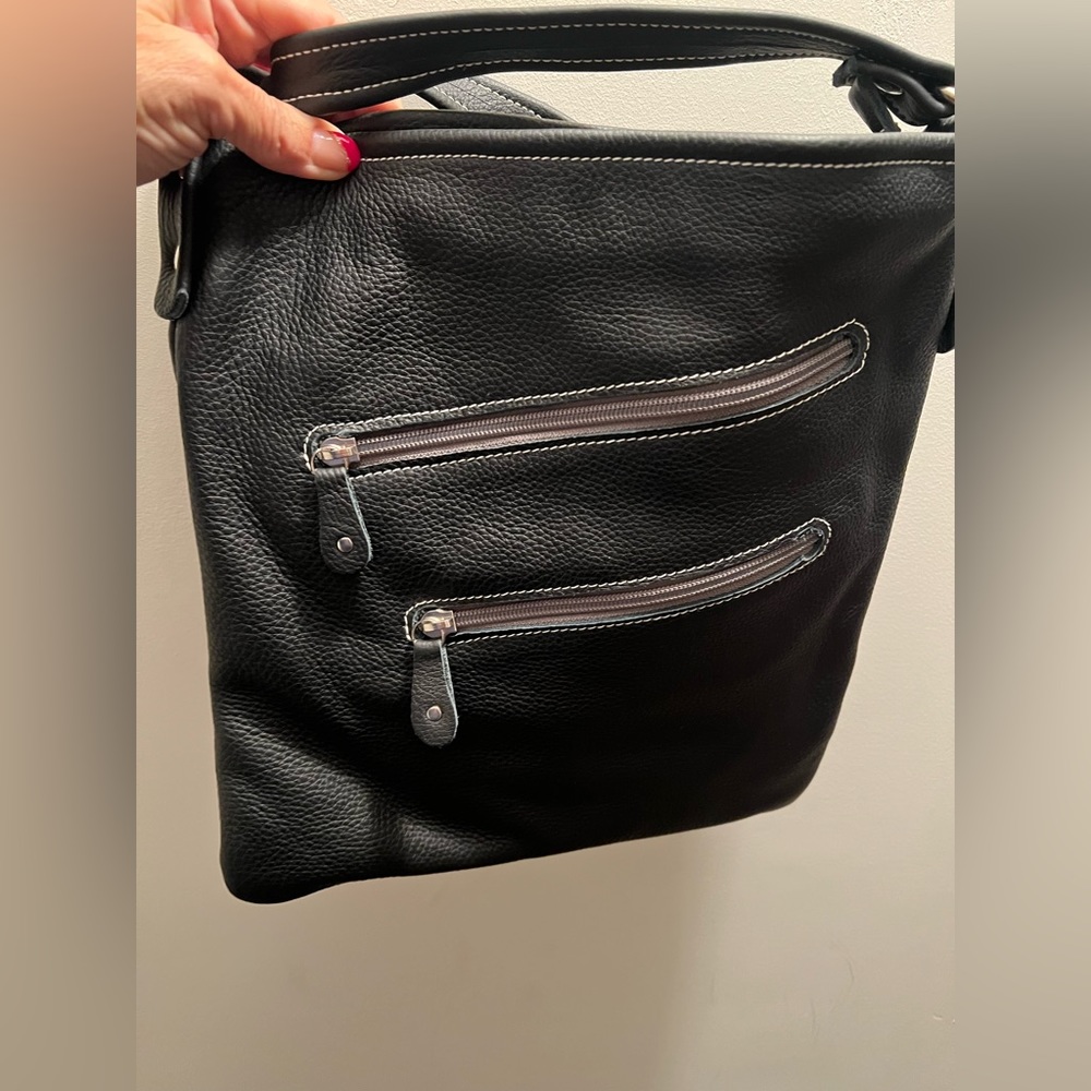 Black leather cross body bag custom made in Rome to fit a 1x-2x body.